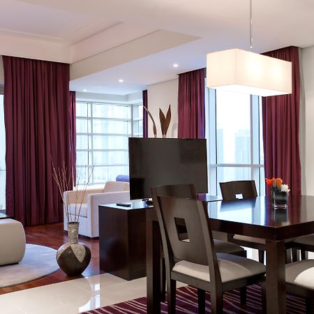 Pullman Dubai Jumeirah Lakes Towers Bagian luar foto A suite at the hotel