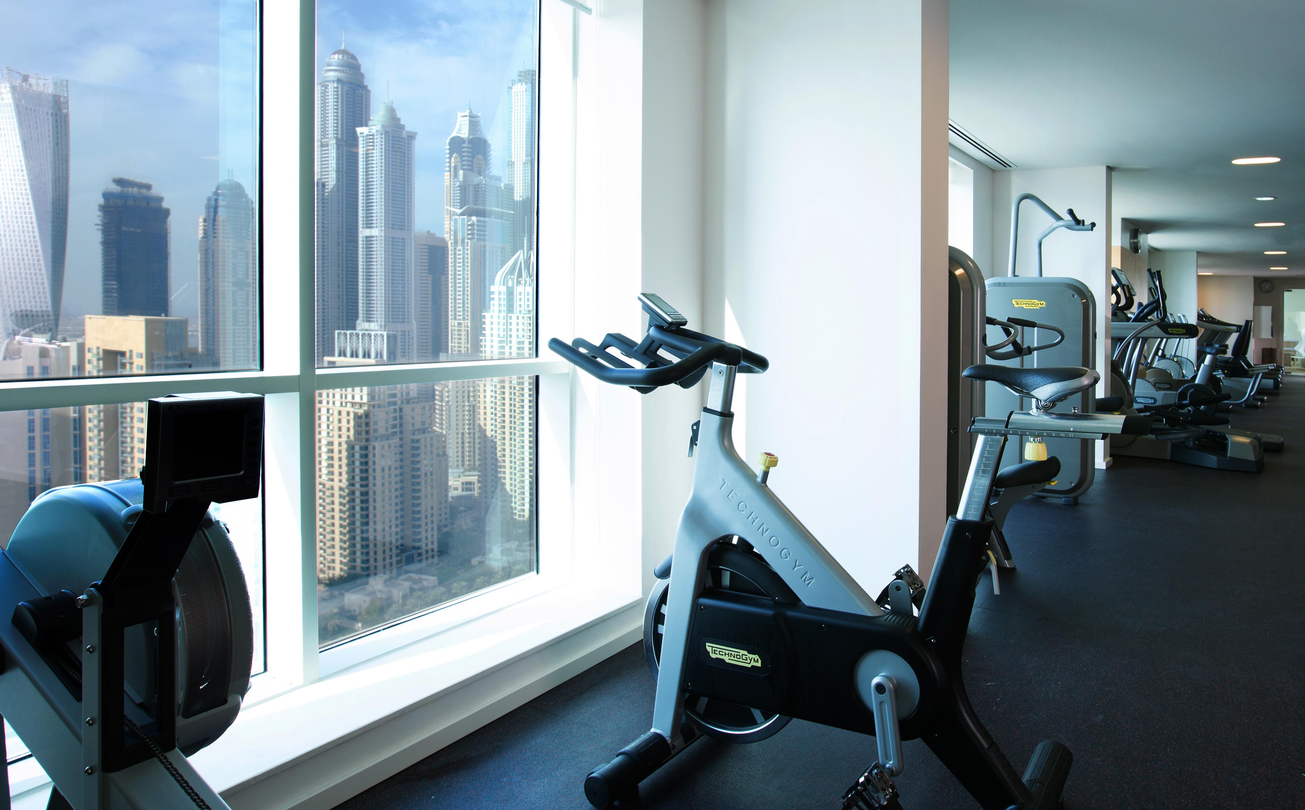 Pullman Dubai Jumeirah Lakes Towers Bagian luar foto The gym at the Address Downtown Hotel